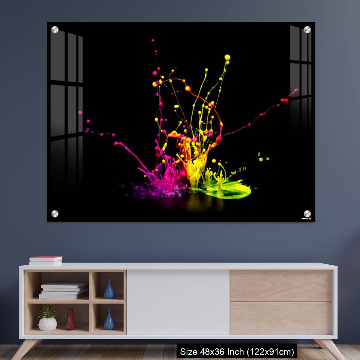 OMGs Acrylic Wall Decor – Colorful paint splashing on audio speaker isolated on black background